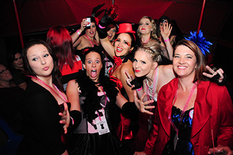 Group of girls at a Hens party dressed up burlesque party wear