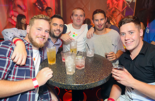 lads drinking at gold coast nightclub on Down Under pub crawl
